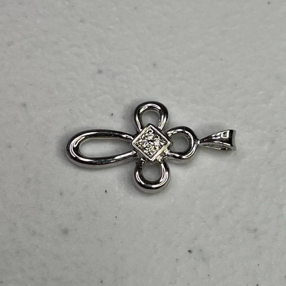 Small Cross Silver-Tone Pendant With Cubic Zirconia Accents - Picture 7 of 9